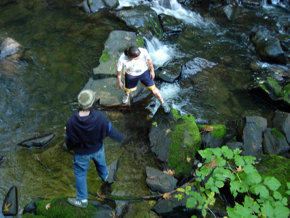 Playing on the rocks in the stream